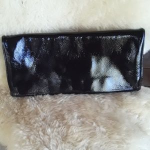 Patent leather hobo International handbag, clutch